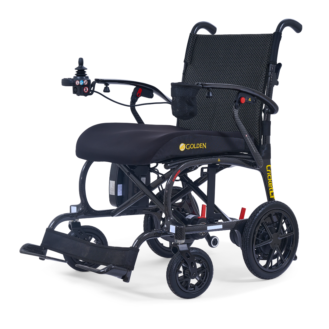 The Golden Cricket™ LT Carbon Portable Lightweight Powerchair weighs just 25 lbs and features a black padded seat, right arm joystick control, footrests, large rear wheels, small front wheels, and "Golden" branding on the seat's side.